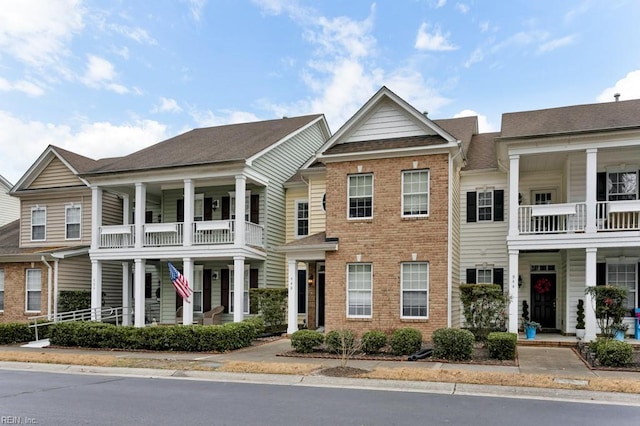940 Sugar Oak Dr, Virginia Beach, VA 23462 - townhome / multi-family property with covered porch and brick siding