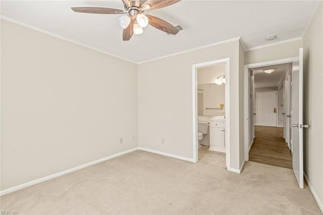 3955 Palomino Dr Unit 201, Newport News, VA 23602 - unfurnished bedroom featuring light carpet, baseboards, crown molding, and connected bathroom