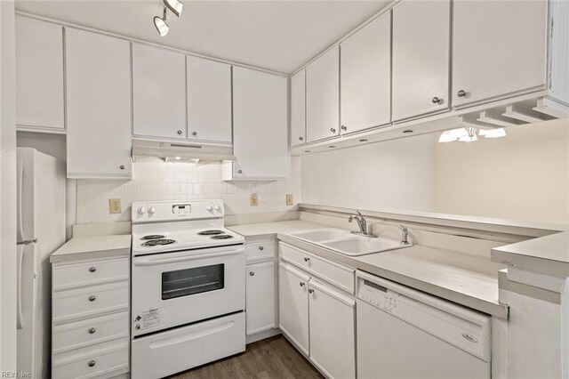 3955 Palomino Dr Unit 201, Newport News, VA 23602 - kitchen featuring decorative backsplash, a sink, under cabinet range hood, and white appliances