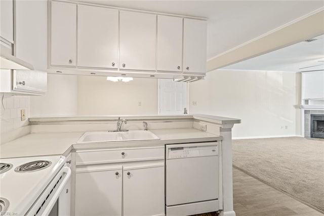 3955 Palomino Dr Unit 201, Newport News, VA 23602 - kitchen with light countertops, a sink, dishwasher, open floor plan, and white cabinets