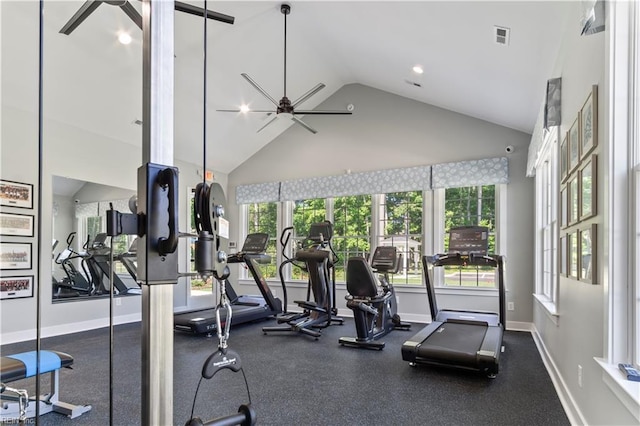 workout area featuring a ceiling fan, high vaulted ceiling, visible vents, and baseboards