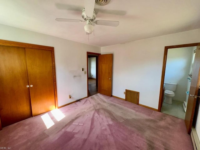 unfurnished bedroom with ceiling fan, ensuite bathroom, a closet, carpet floors, and baseboards
