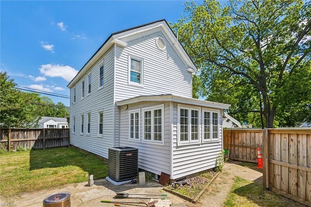 3608 Shell Rd, Hampton, VA 23661 - rear view of property with an outdoor fire pit and a fenced backyard