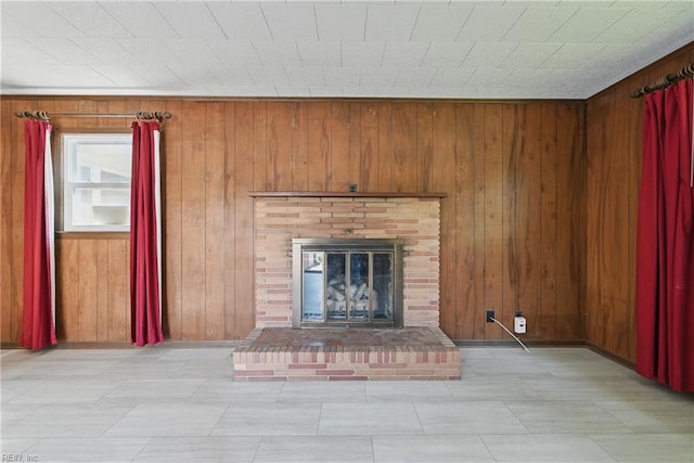 8084 Lynnbrook Dr, Norfolk, VA 23518 - unfurnished living room with a fireplace, wooden walls, and baseboards