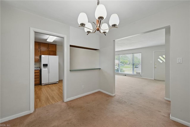 8084 Lynnbrook Dr, Norfolk, VA 23518 - empty room featuring carpet floors, a chandelier, and baseboards