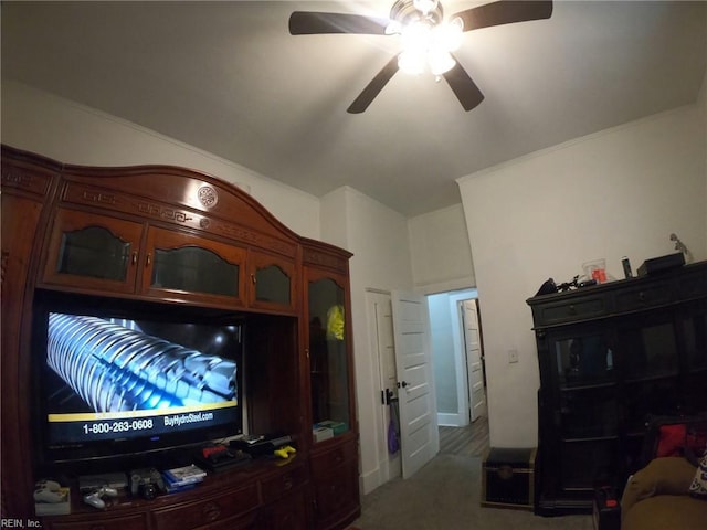 interior space featuring ceiling fan and carpet floors