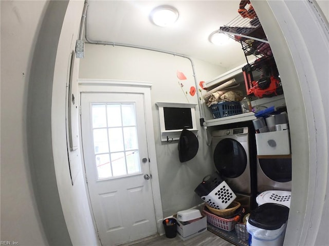 washroom with laundry area and washer / clothes dryer