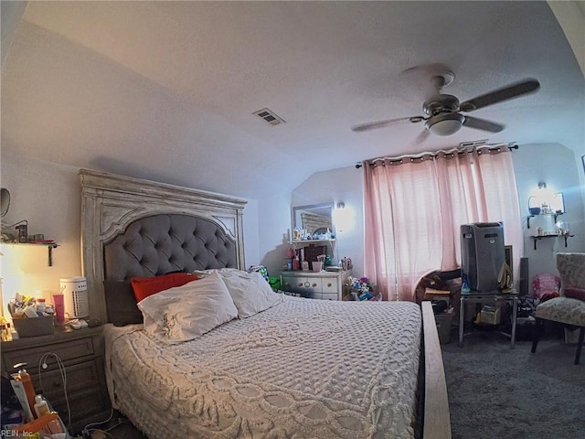 bedroom featuring lofted ceiling, ceiling fan, carpet flooring, and visible vents