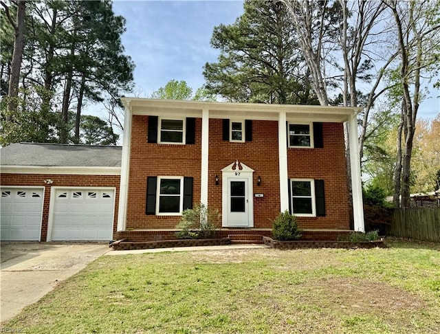 97 Waterview Dr, Newport News, VA 23608 - greek revival house featuring fence, a garage, a front yard, brick siding, and driveway