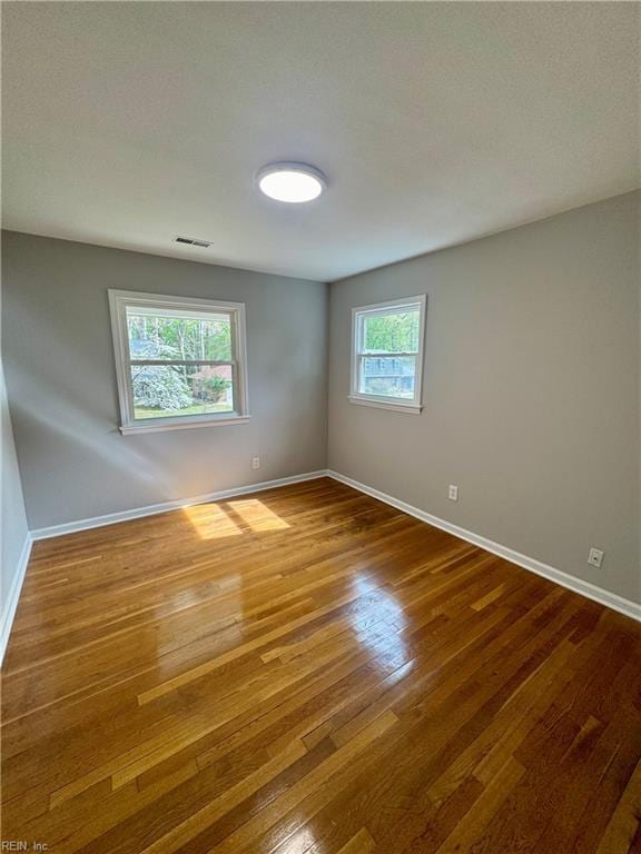 97 Waterview Dr, Newport News, VA 23608 - unfurnished room featuring hardwood / wood-style floors, baseboards, and visible vents