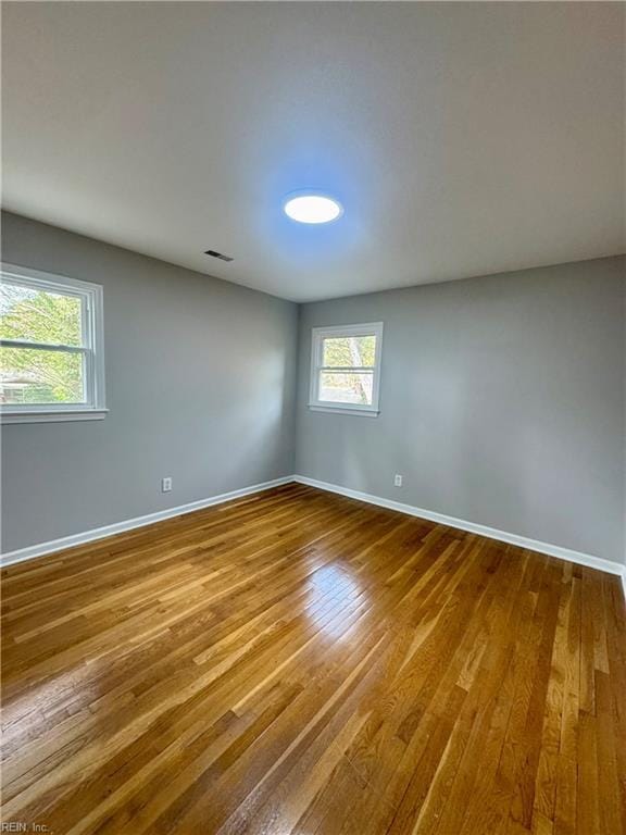 97 Waterview Dr, Newport News, VA 23608 - spare room featuring baseboards, visible vents, and wood finished floors