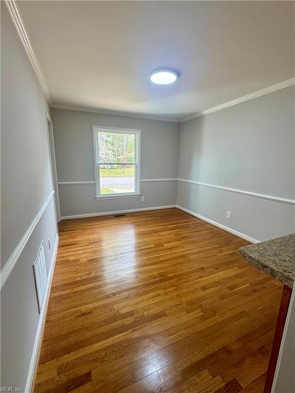 97 Waterview Dr, Newport News, VA 23608 - empty room featuring visible vents, crown molding, baseboards, and wood finished floors