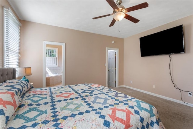 carpeted bedroom with baseboards, a ceiling fan, and connected bathroom