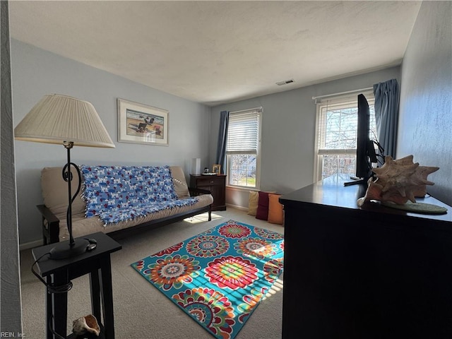 interior space featuring visible vents and baseboards