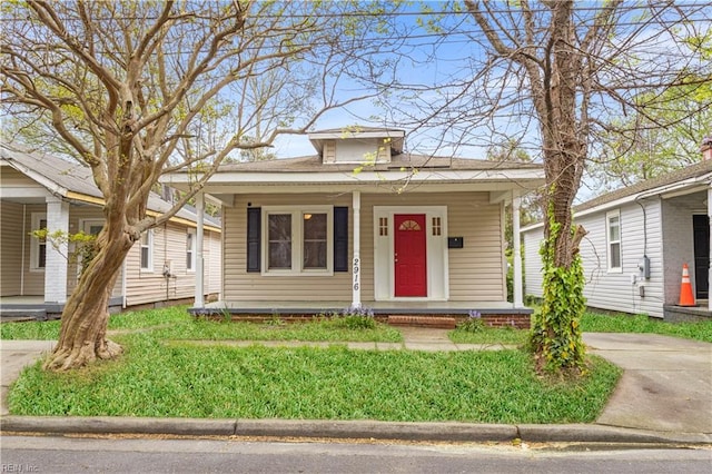 2916 Somme Ave, Norfolk, VA 23509 - view of front of house featuring covered porch and a front yard