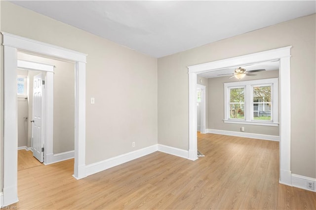 2916 Somme Ave, Norfolk, VA 23509 - spare room with light wood-style flooring, baseboards, and ceiling fan