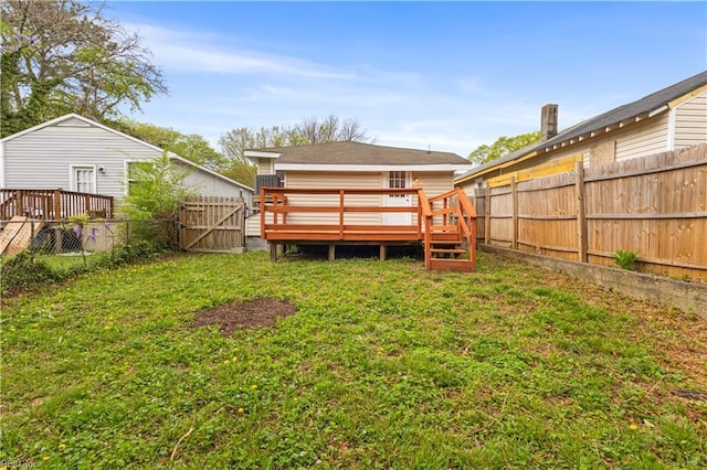 2916 Somme Ave, Norfolk, VA 23509 - rear view of property with a wooden deck and a gate