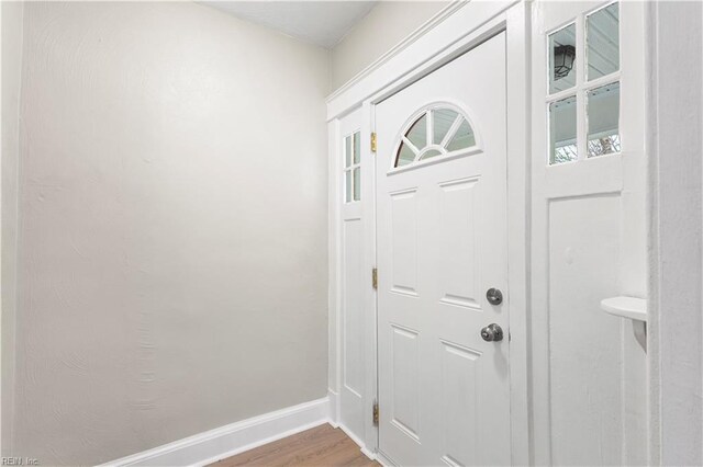 2916 Somme Ave, Norfolk, VA 23509 - doorway with wood finished floors and baseboards