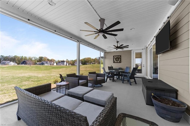 view of patio / terrace with outdoor dining area, outdoor lounge area, and ceiling fan