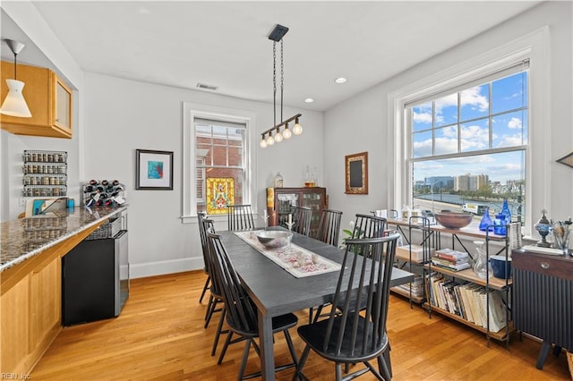 429 York St W Unit 3A, Norfolk, VA 23510 - dining area with light wood-style flooring, radiator heating unit, visible vents, recessed lighting, and baseboards