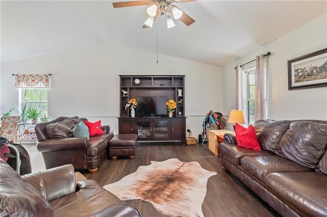living room with wood finished floors, ceiling fan, vaulted ceiling, and a wealth of natural light