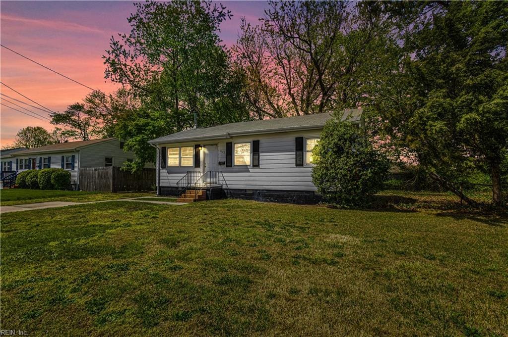 1125 76th St, Newport News, VA 23605 - view of front of property featuring fence and a front lawn
