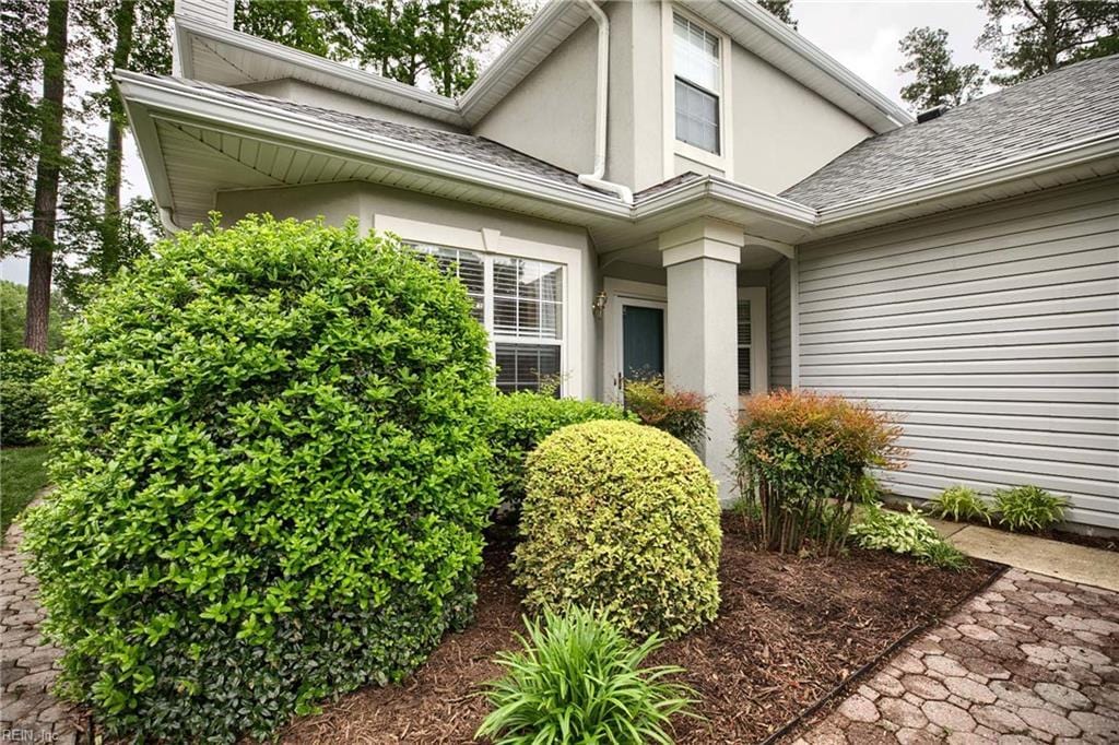 814 E Willow Point Pl, Newport News, VA 23602 - entrance to property with stucco siding and roof with shingles