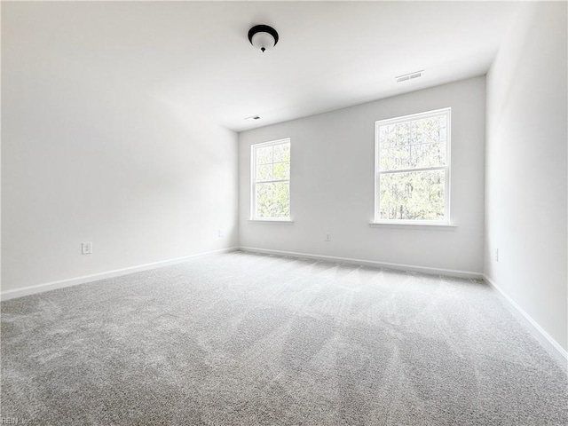 1541 Waltham Ln, Newport News, VA 23608 - carpeted spare room featuring baseboards