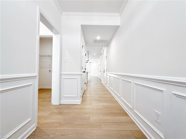 1541 Waltham Ln, Newport News, VA 23608 - hall featuring ornamental molding, light wood-style floors, wainscoting, and a decorative wall