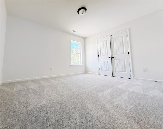 1539 Waltham Ln, Newport News, VA 23608 - unfurnished bedroom featuring carpet and a closet