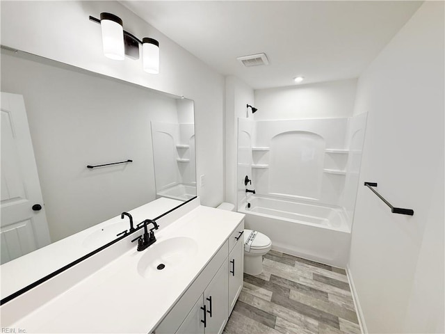 1539 Waltham Ln, Newport News, VA 23608 - bathroom featuring wood finished floors, vanity, and washtub / shower combination