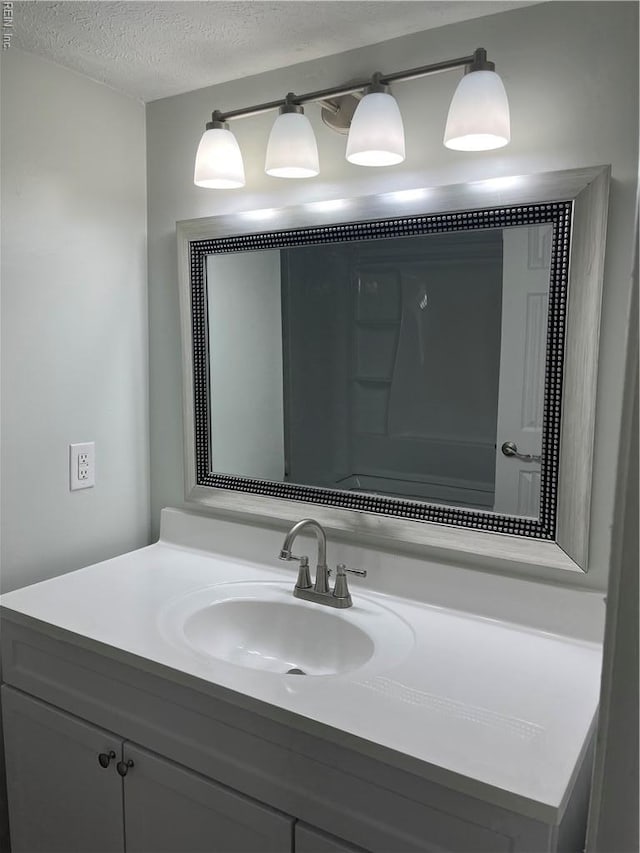 161 Haverford Ct Unit 2, Hampton, VA 23666 - bathroom featuring vanity and a textured ceiling