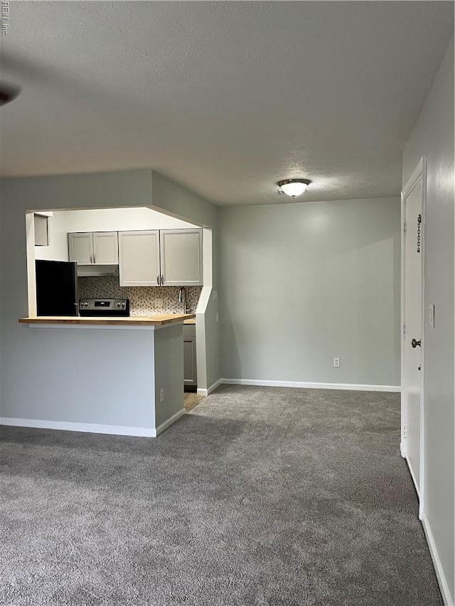 161 Haverford Ct Unit 2, Hampton, VA 23666 - kitchen featuring carpet flooring, stainless steel electric stove, a textured ceiling, decorative backsplash, and black fridge