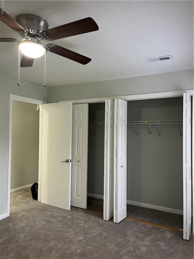 161 Haverford Ct Unit 2, Hampton, VA 23666 - unfurnished bedroom featuring carpet floors, two closets, ceiling fan, and baseboards