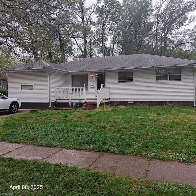 view of front facade with crawl space, roof with shingles, covered porch, and a front lawn