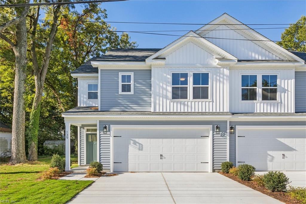 139 Morrison Ave, Virginia Beach, VA 23452 - view of front of home with an attached garage, board and batten siding, and concrete driveway