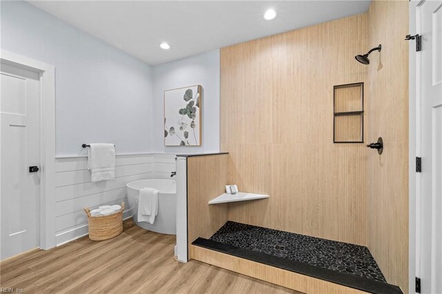 3545 Winston Ave, Virginia Beach, VA 23456 - bathroom featuring tiled shower, a freestanding tub, a wainscoted wall, recessed lighting, and wood finished floors