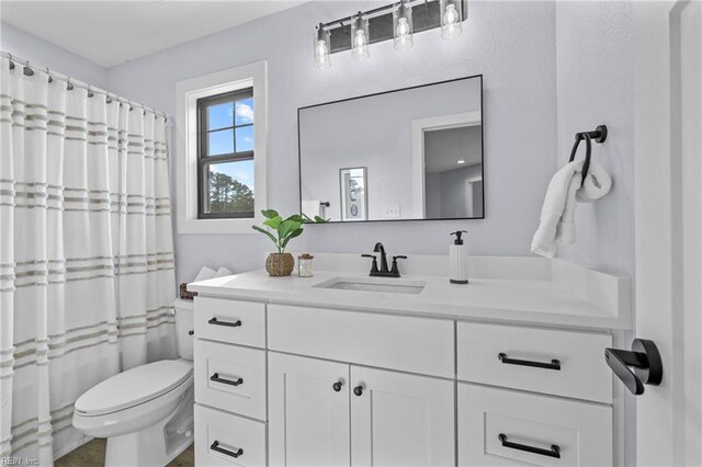 3545 Winston Ave, Virginia Beach, VA 23456 - full bathroom with toilet, vanity, and a shower with curtain