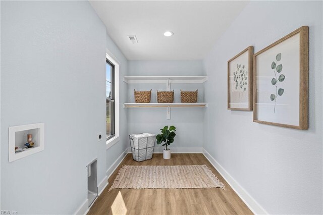 3545 Winston Ave, Virginia Beach, VA 23456 - laundry room with visible vents, baseboards, washer hookup, laundry area, and wood finished floors