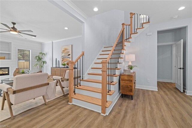 3545 Winston Ave, Virginia Beach, VA 23456 - stairway with crown molding, wood finished floors, ceiling fan, and recessed lighting