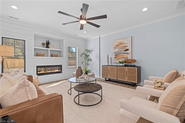 3545 Winston Ave, Virginia Beach, VA 23456 - living room with visible vents, ceiling fan, ornamental molding, and wood finished floors