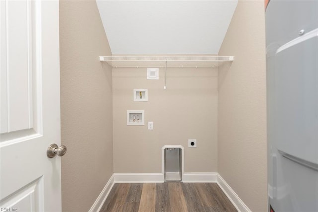 laundry area with laundry area, electric dryer hookup, dark wood-type flooring, washer hookup, and baseboards