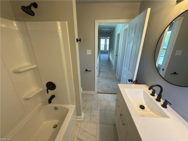 full bathroom featuring bathtub / shower combination, vanity, marble finish floor, and baseboards