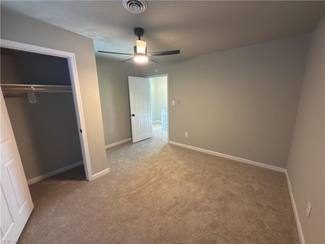unfurnished bedroom with visible vents, baseboards, a closet, ceiling fan, and carpet flooring