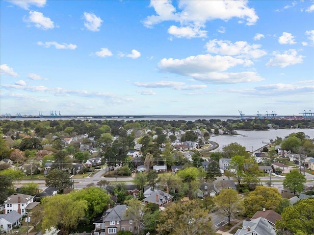 bird's eye view with a residential view and a water view