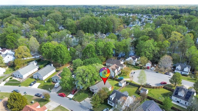 bird's eye view with a residential view and a forest view