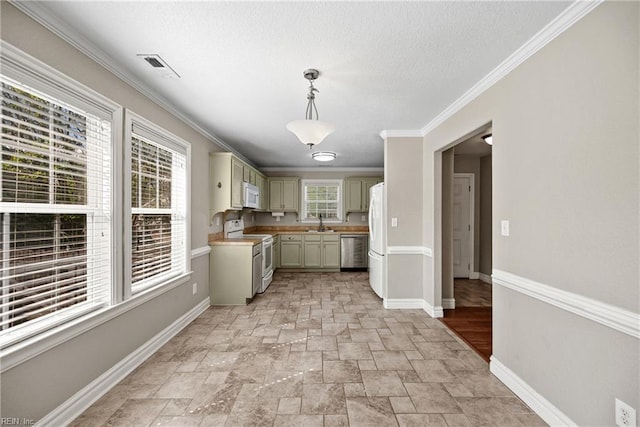 kitchen featuring baseboards, ornamental molding, white appliances, cream cabinets, and visible vents