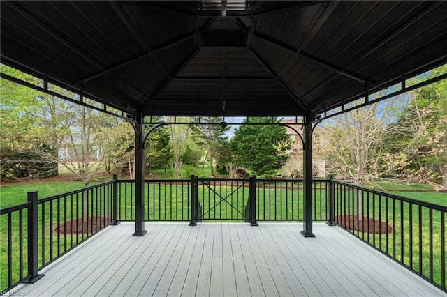 deck with a gazebo and a yard