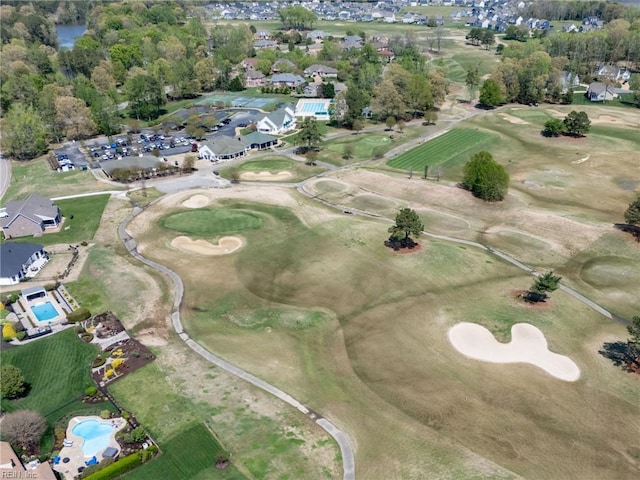 bird's eye view with view of golf course