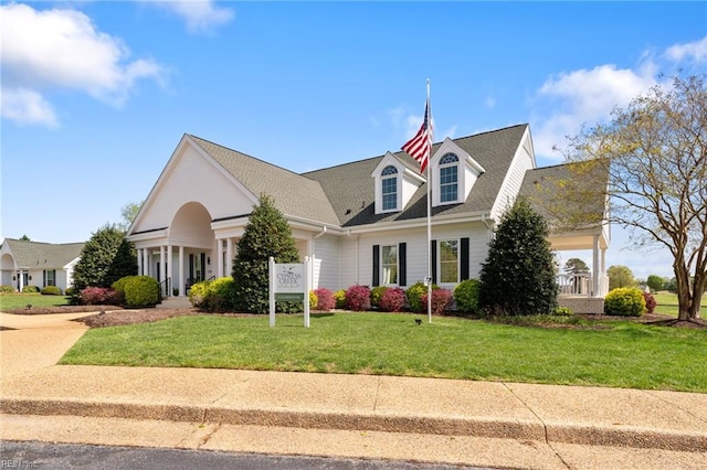 view of front of home with a front lawn